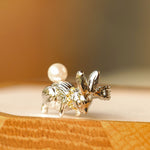 Alice rabbit brooch styled as playful pin jewelry