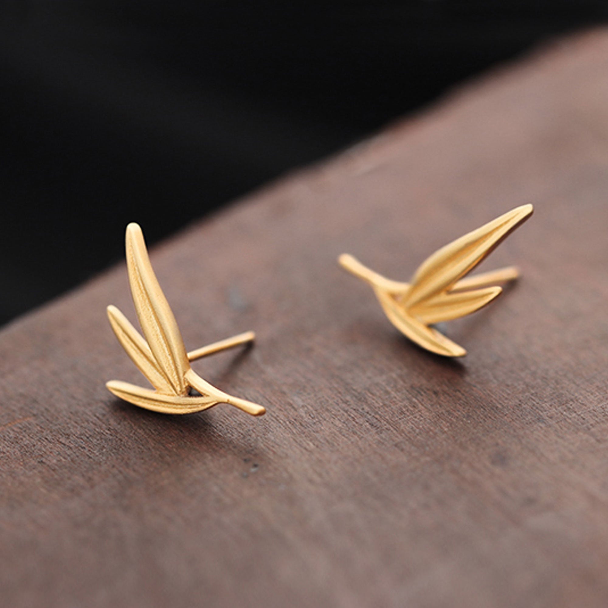Bamboo leaf earrings showing handmade jewelry details
