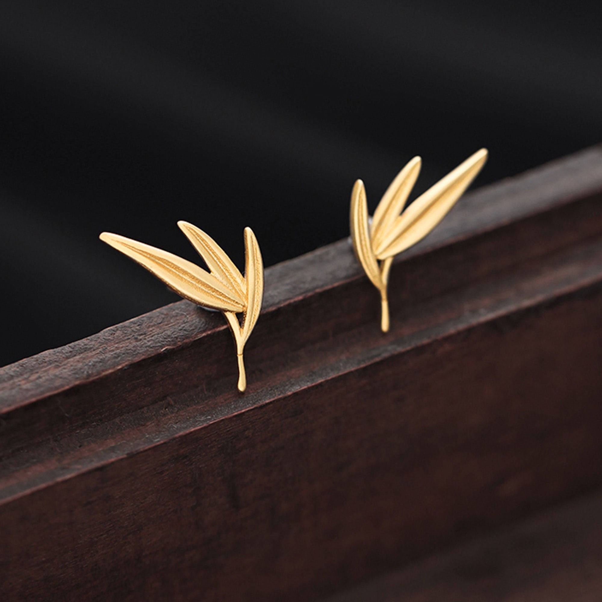 Bamboo leaf earrings styled as nature inspired jewelry