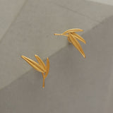 Bamboo leaf earrings displayed as a pair
