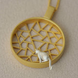 Cat charm necklace showing chain and pendant details