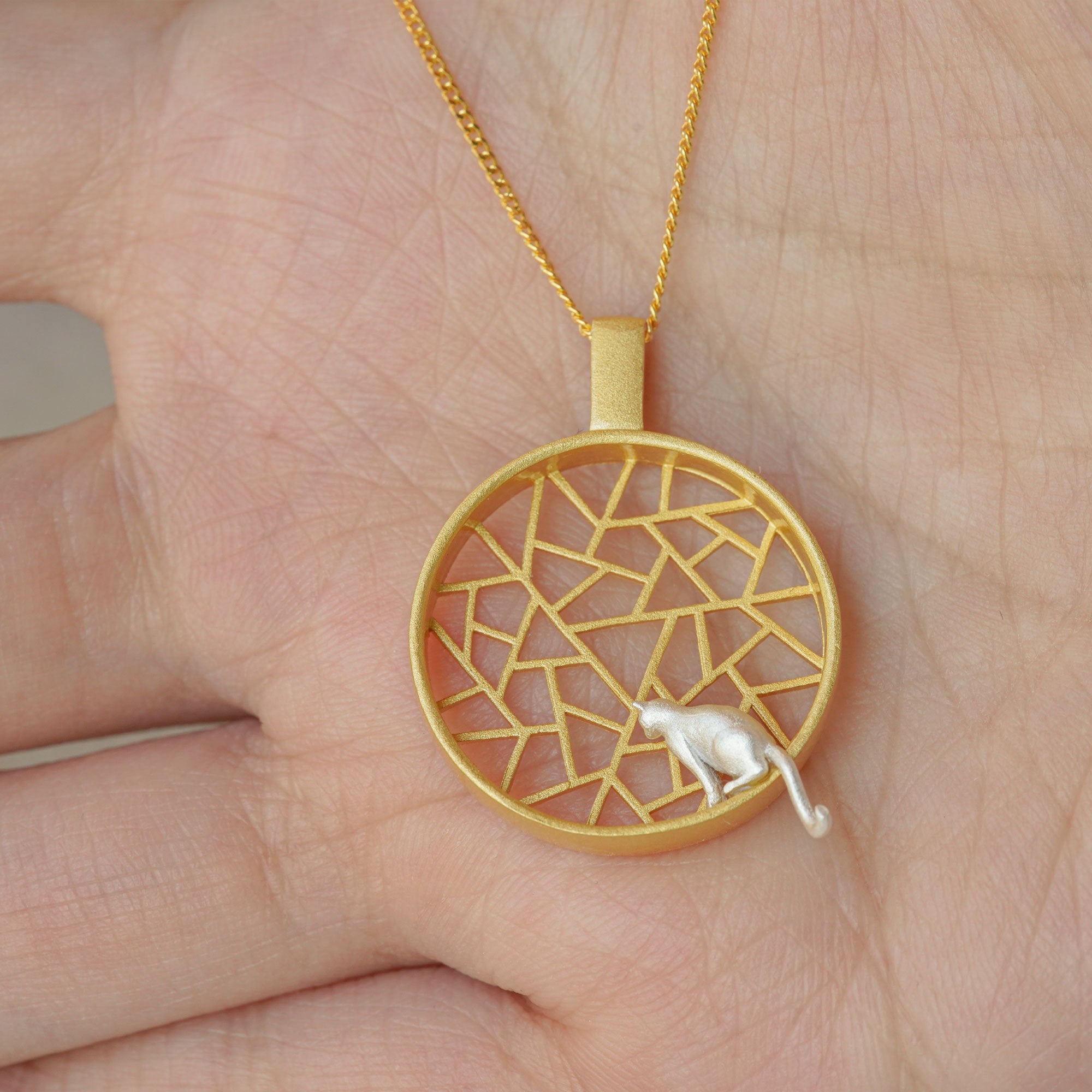 Cat necklace styled as animal inspired jewelry
