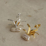 Close-up of daffodils brooch showing flower details