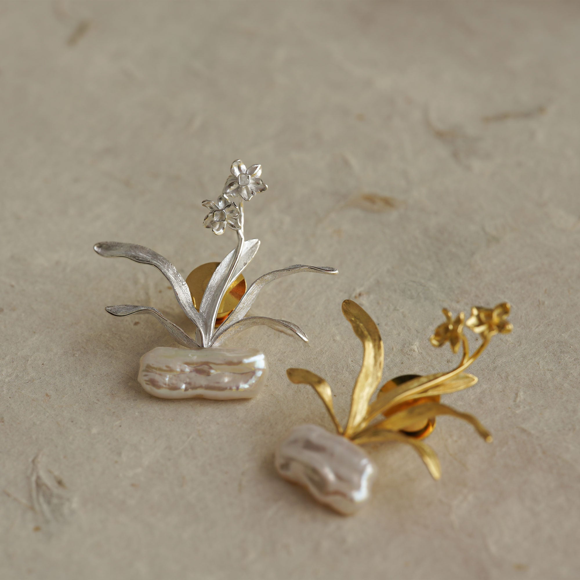 Close-up of daffodils brooch showing flower details
