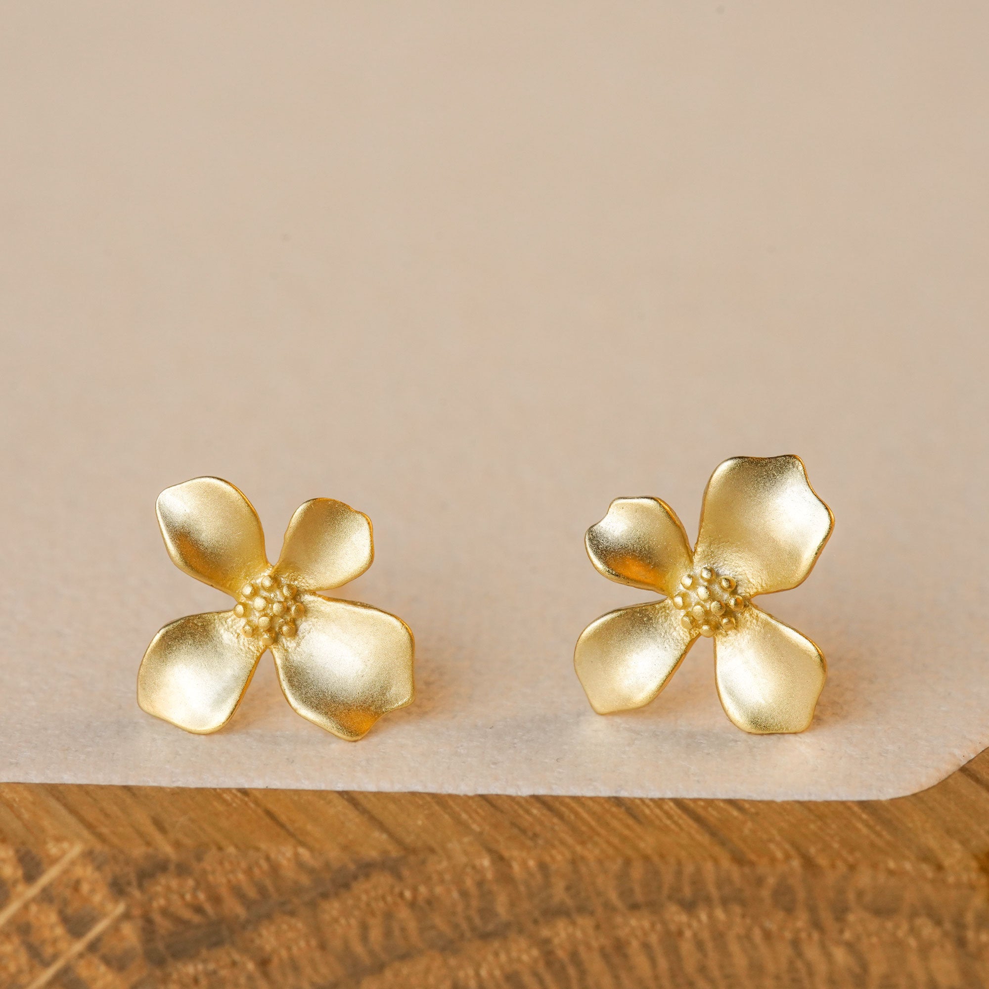 Close-up of gardenia flower earrings showing petal details