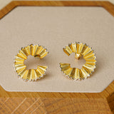 Close-up of pencil earrings showing pencil shape