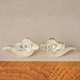 Cloud earrings displayed as a pair