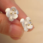 Crab apple flower earrings with delicate blossom design