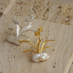 Daffodils brooch styled as botanical jewelry