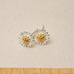 Daisy flower earrings showing handmade details