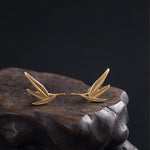 Detailed view of bamboo leaf earrings