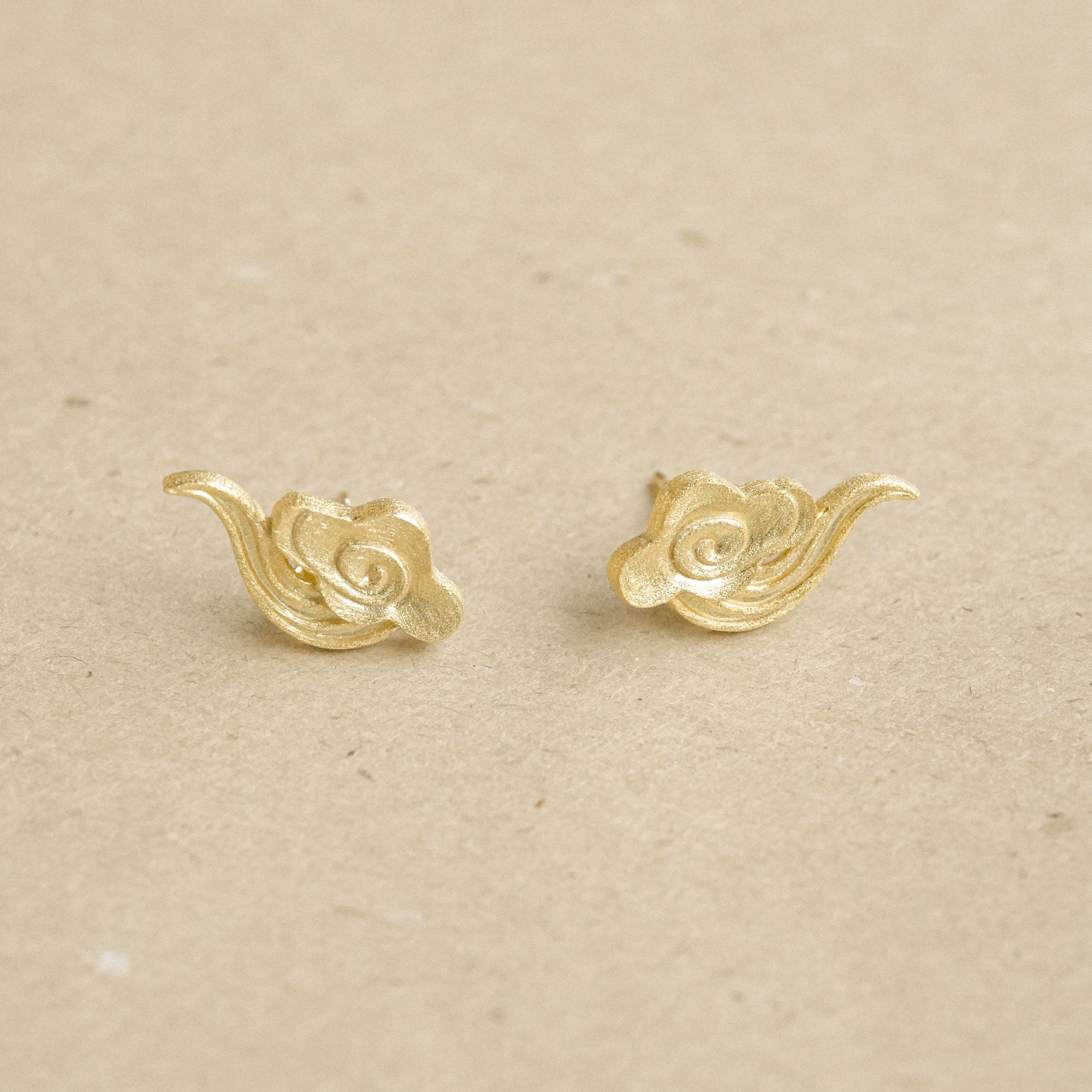 Detailed view of cloud earrings