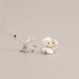 Detailed view of crab apple flower earrings