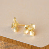 Detailed view of gardenia flower earrings