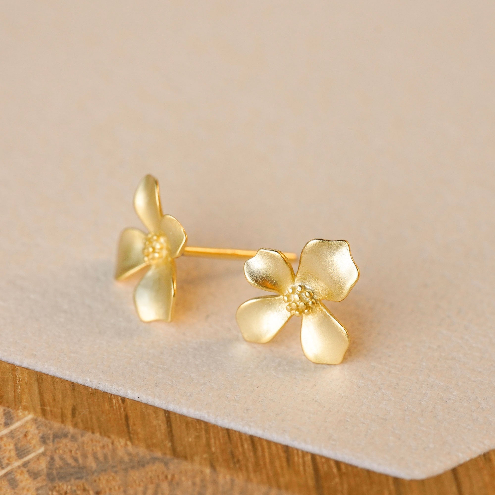 Detailed view of gardenia flower earrings