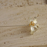 Detailed view of osmanthus brooch