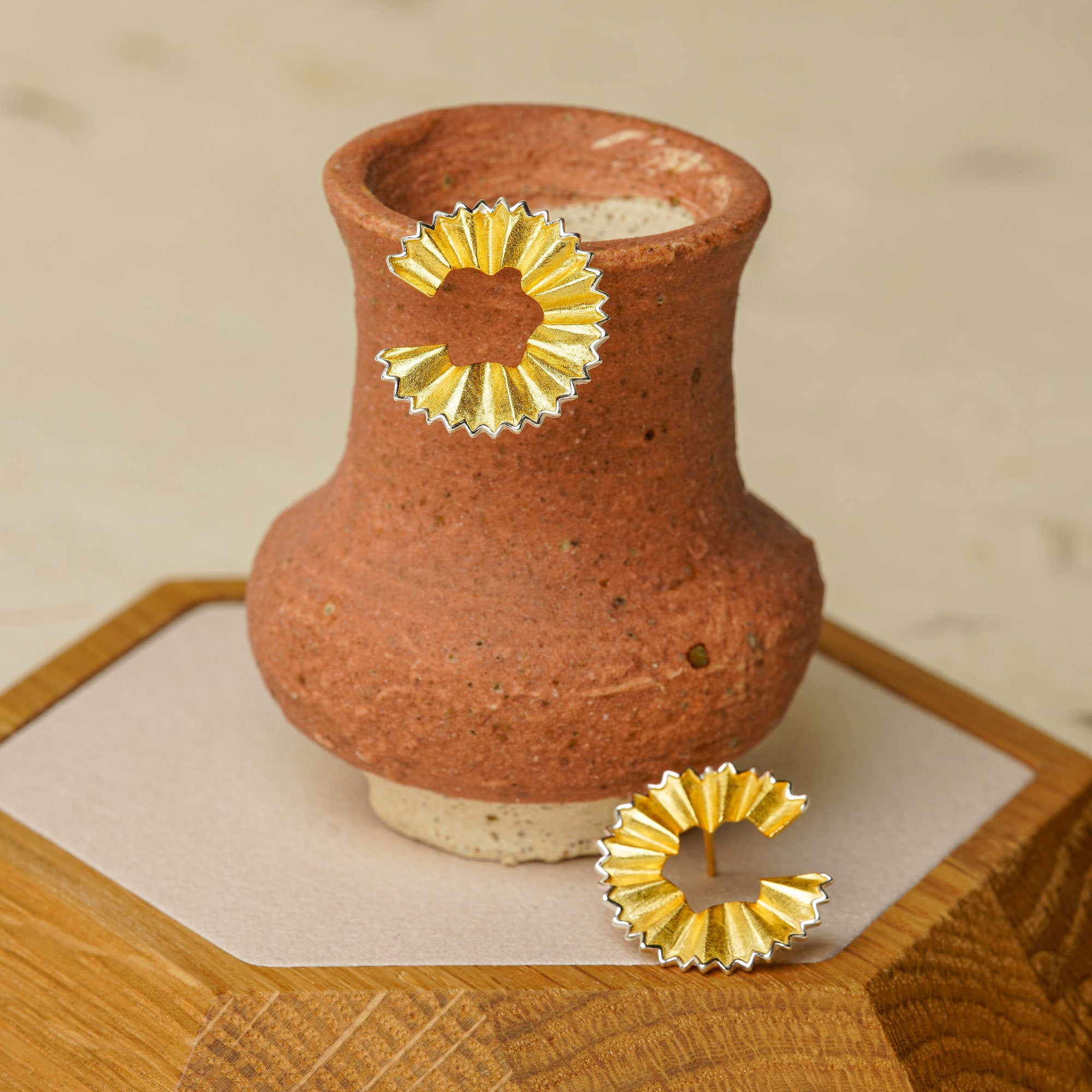 Detailed view of pencil earrings
