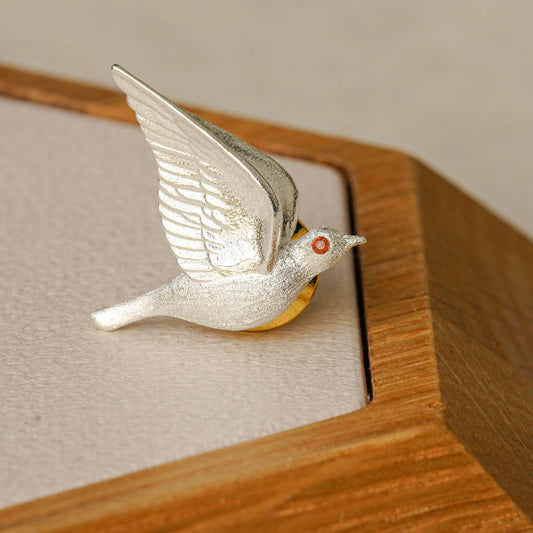 Dove brooch with bird silhouette design
