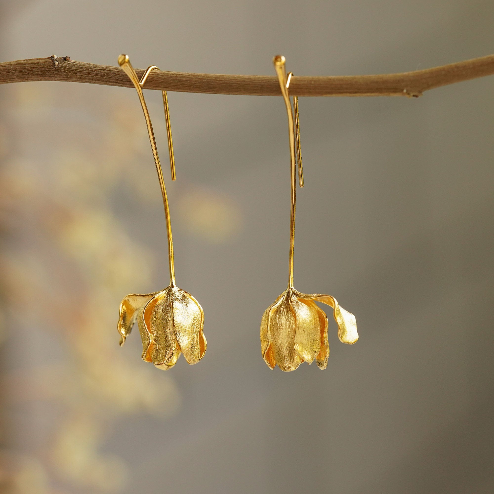 Elegant gold tulip flower earrings