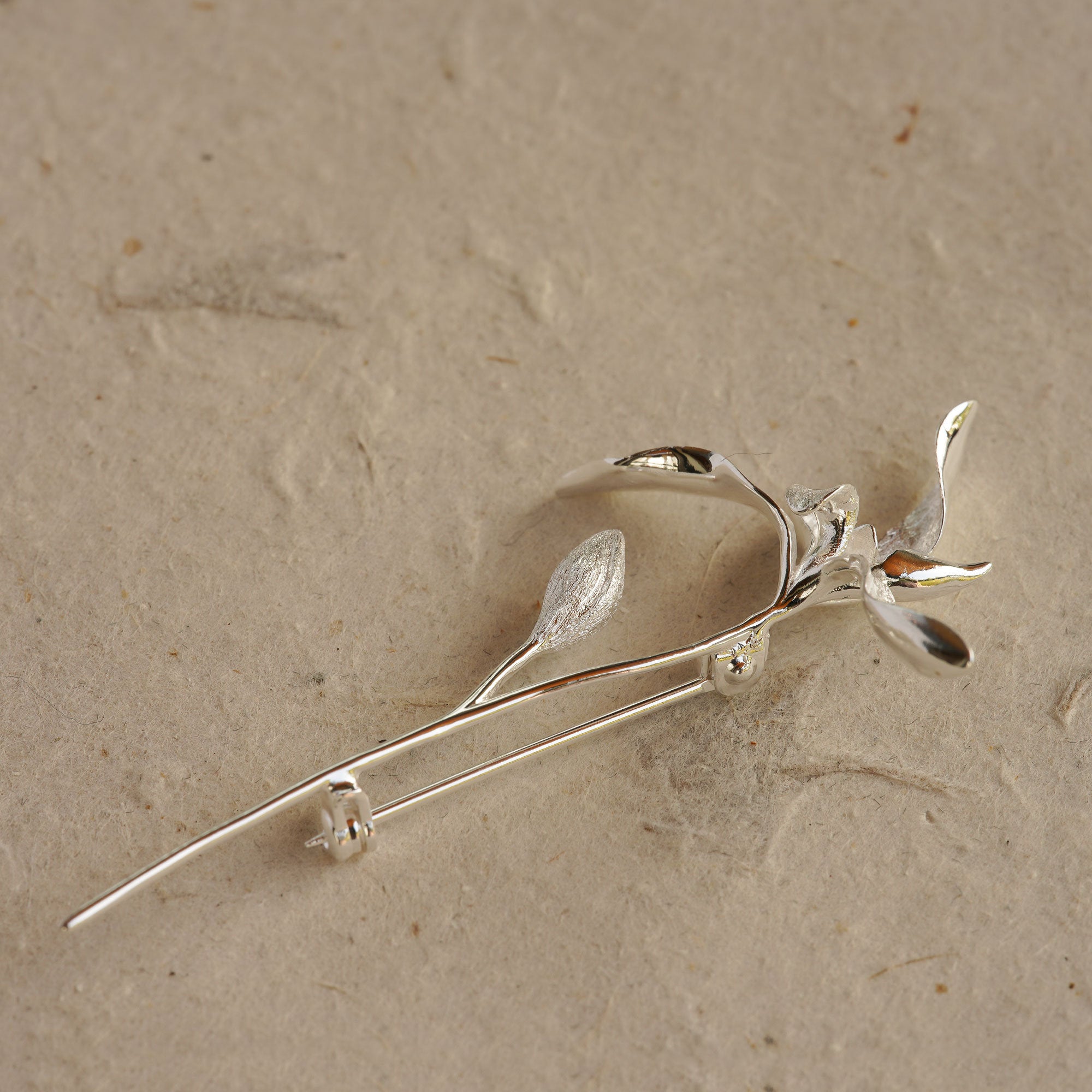 Elegant orchid brooch with realistic flower shape