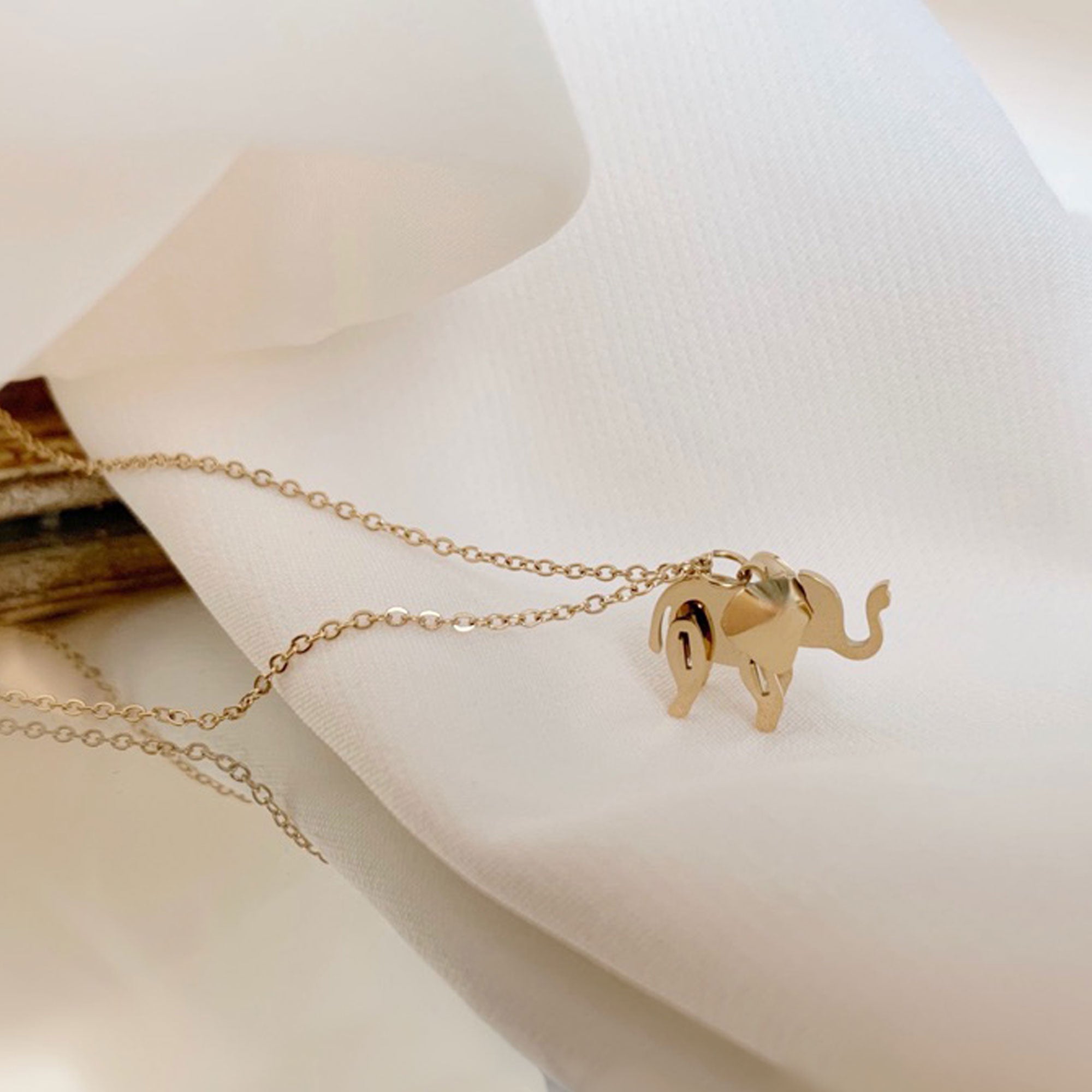 Elephant necklace with animal charm pendant