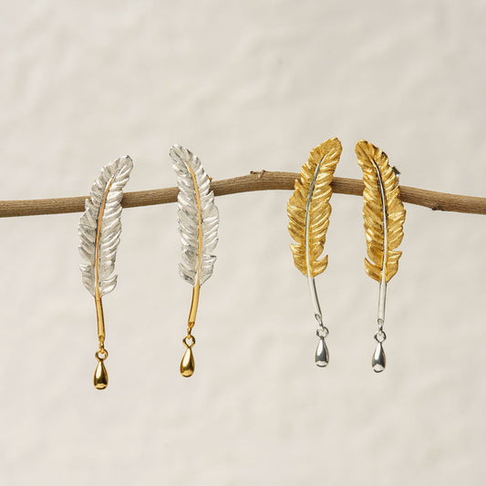 Feather earrings with delicate feather inspired design