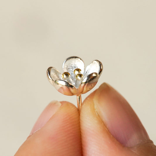 Flower stud earrings with small floral design