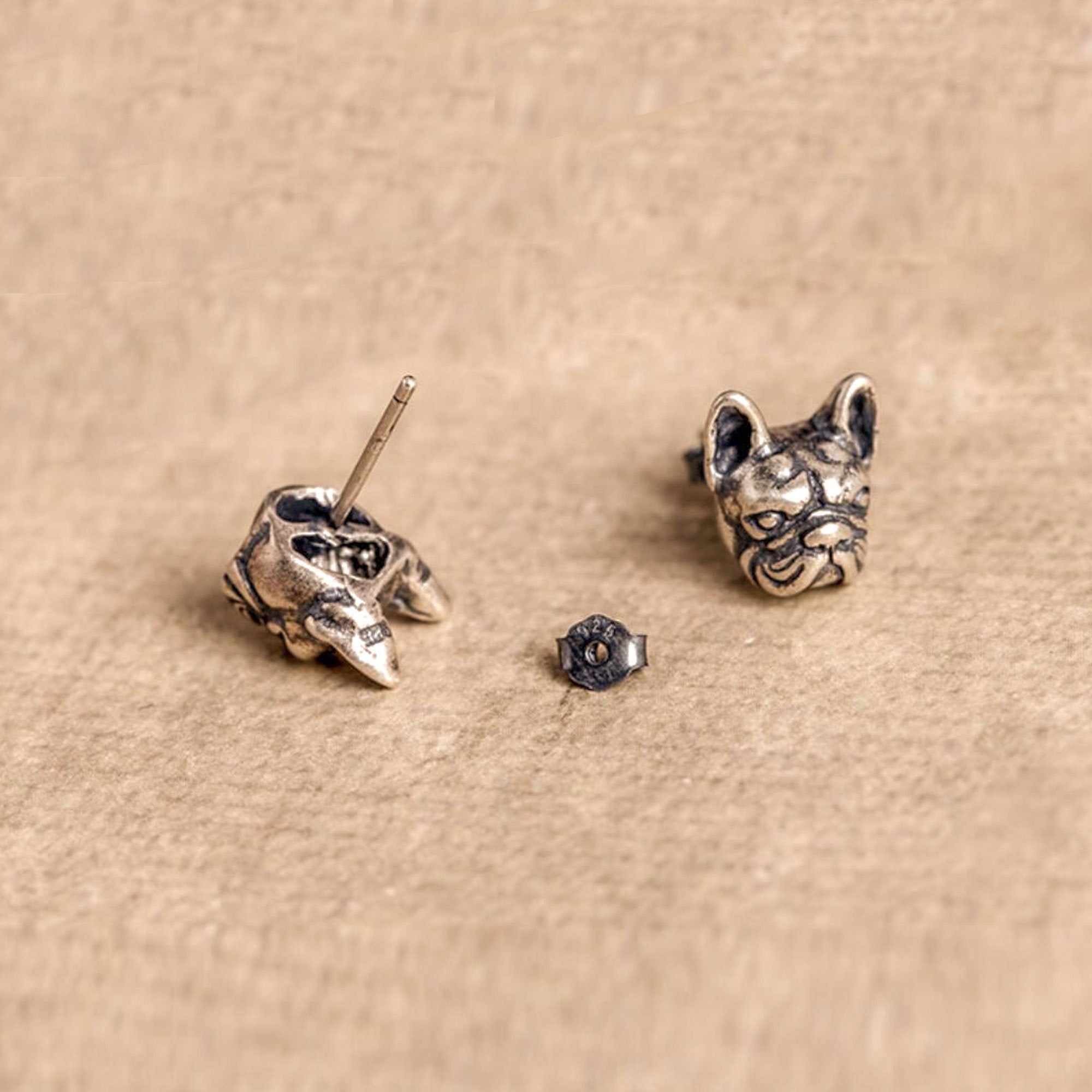 French bulldog studs showing handmade jewelry details
