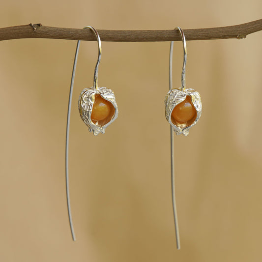 Golden berry earrings with botanical drop design
