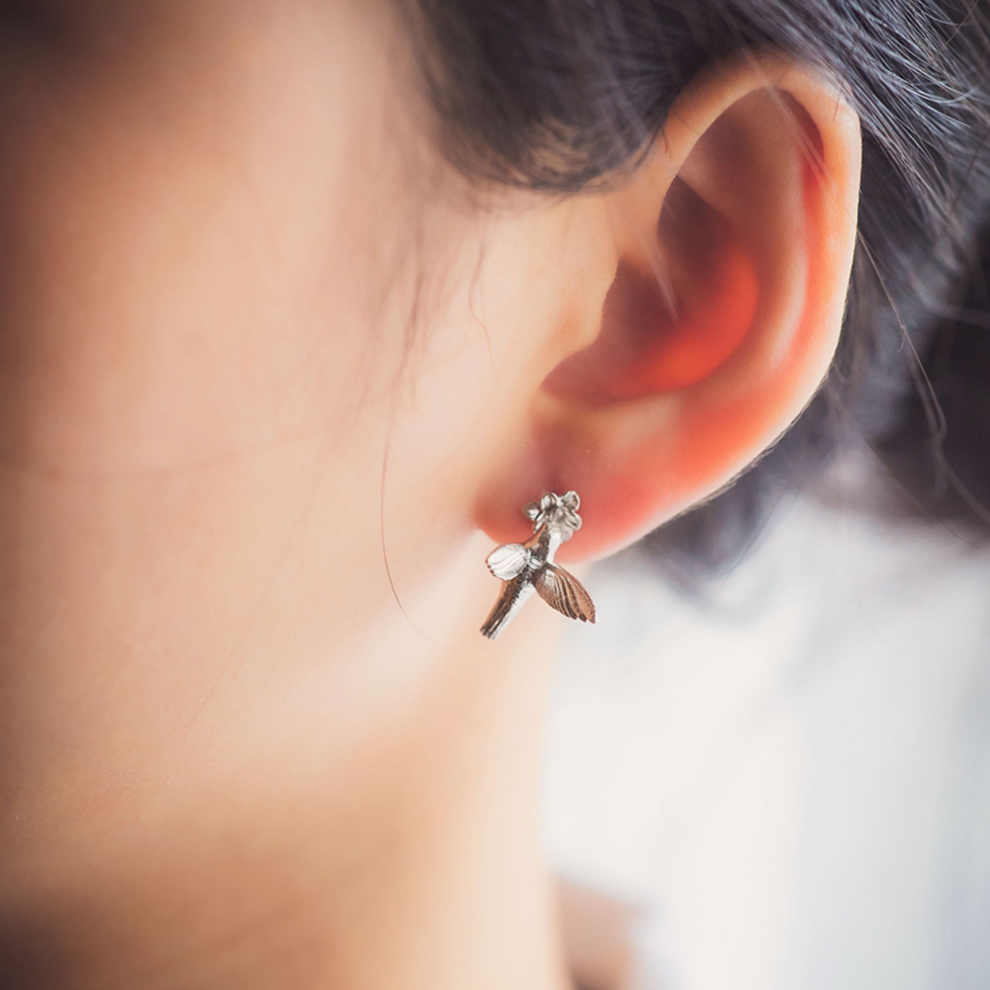 Hummingbird earrings styled as bird inspired jewelry