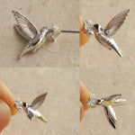 Hummingbird stud earrings showing wing details