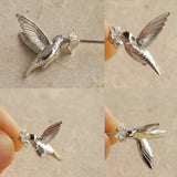 Hummingbird stud earrings showing wing details