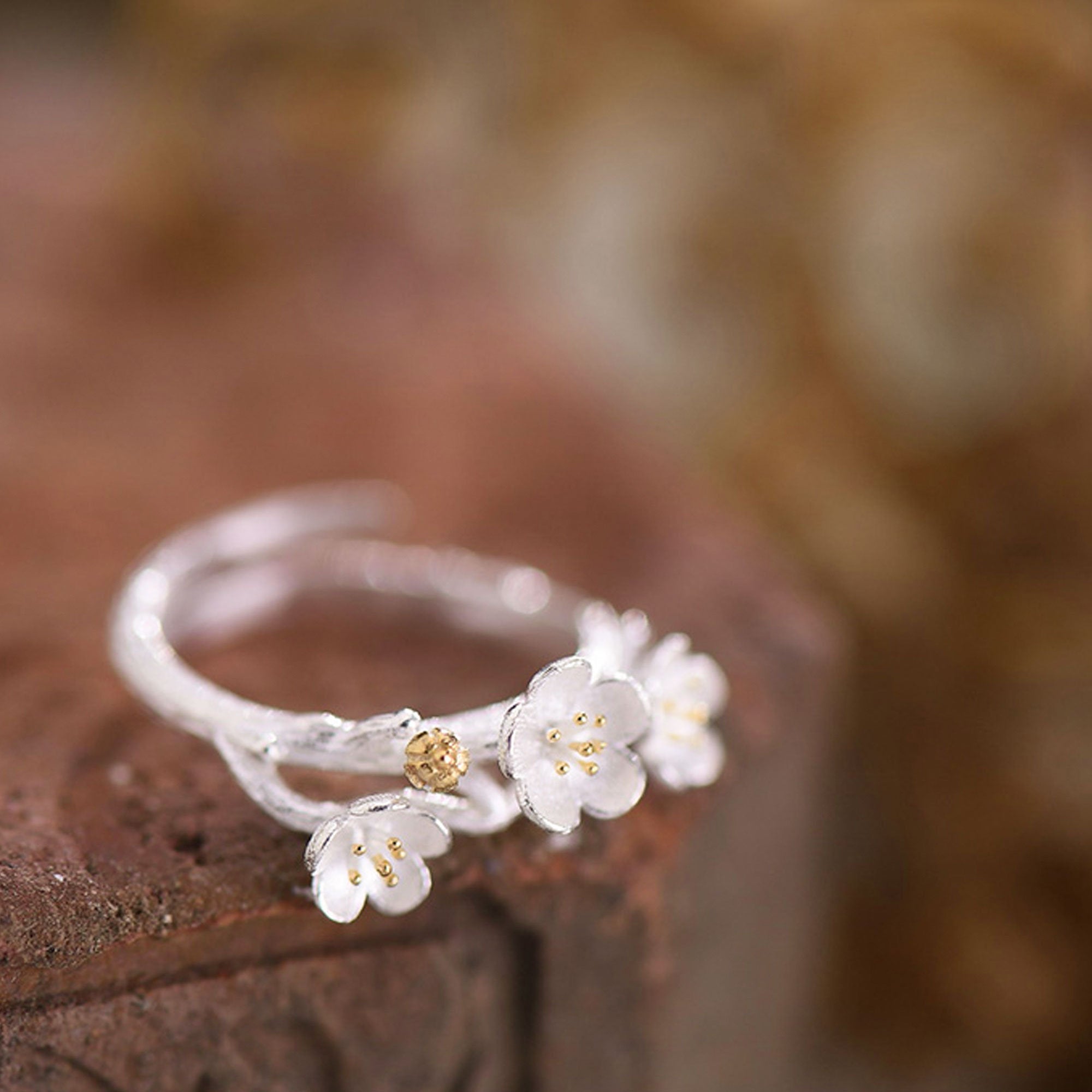 Plum deals blossom ring