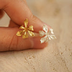 Iris earring studs with floral petal design