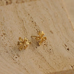 Iris earring studs showing handmade jewelry details