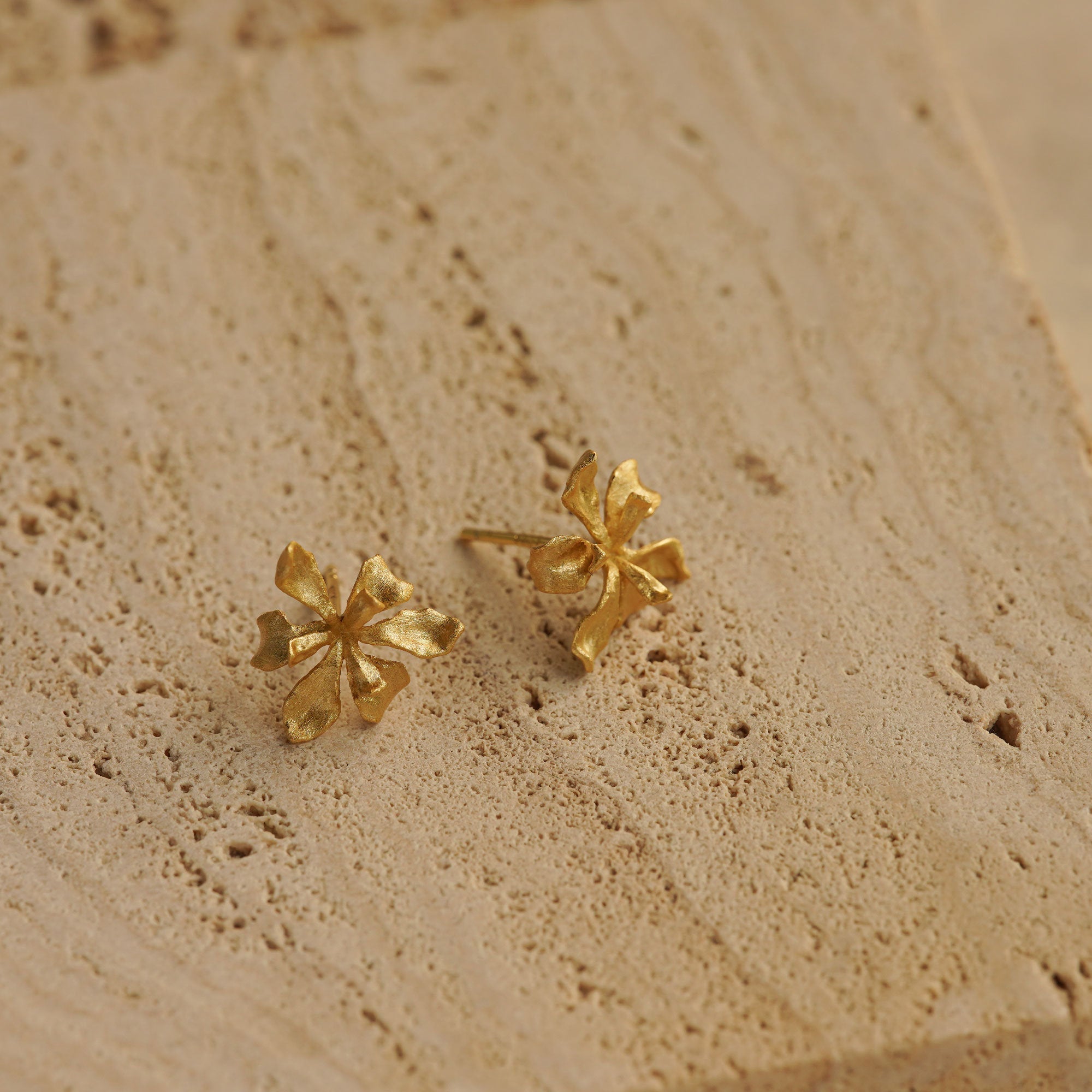 Iris earring studs showing handmade jewelry details