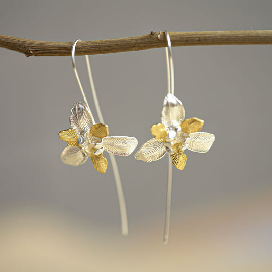 Iris earrings with floral drop design