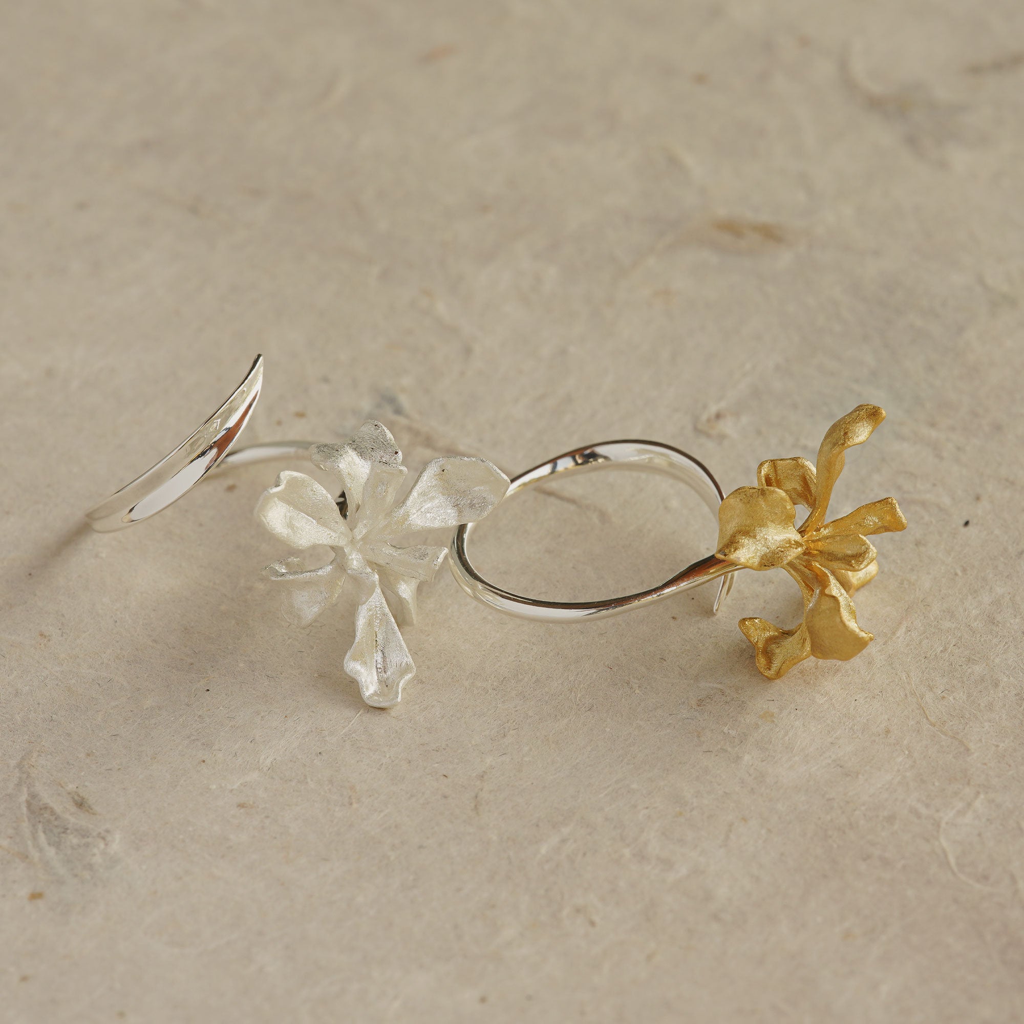 Iris floral ring displayed on neutral background