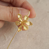 Iris flower drop earrings styled as botanical jewelry