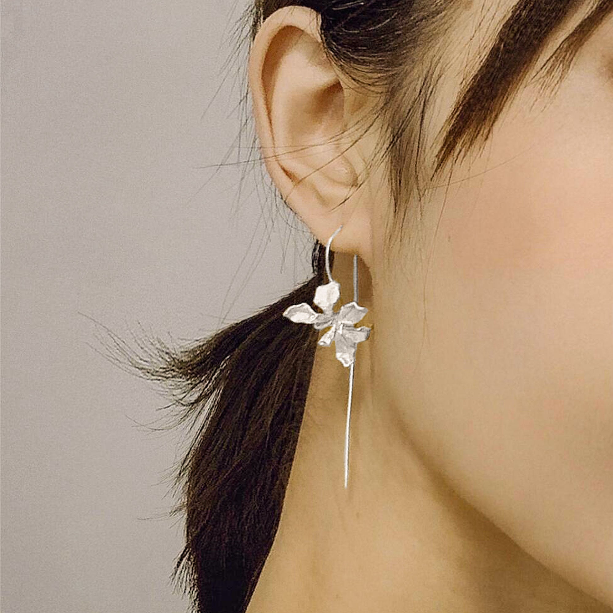 Iris flower drop earrings displayed as a pair