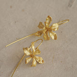 Iris flower earrings showing handmade jewelry details