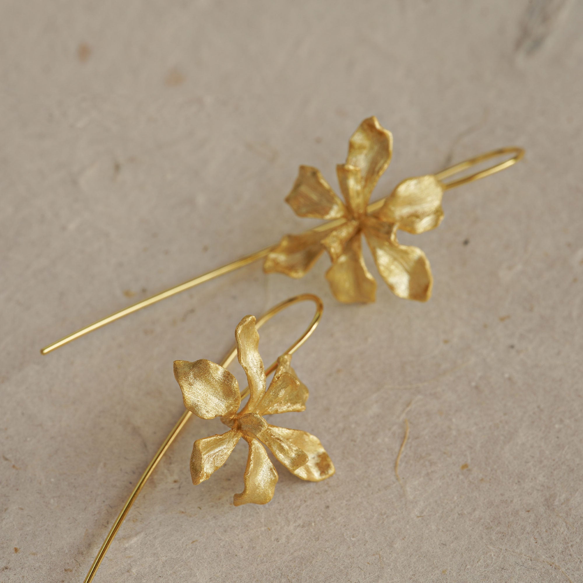 Iris flower earrings showing handmade jewelry details