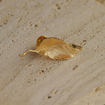 Leaf brooch styled as nature inspired jewelry