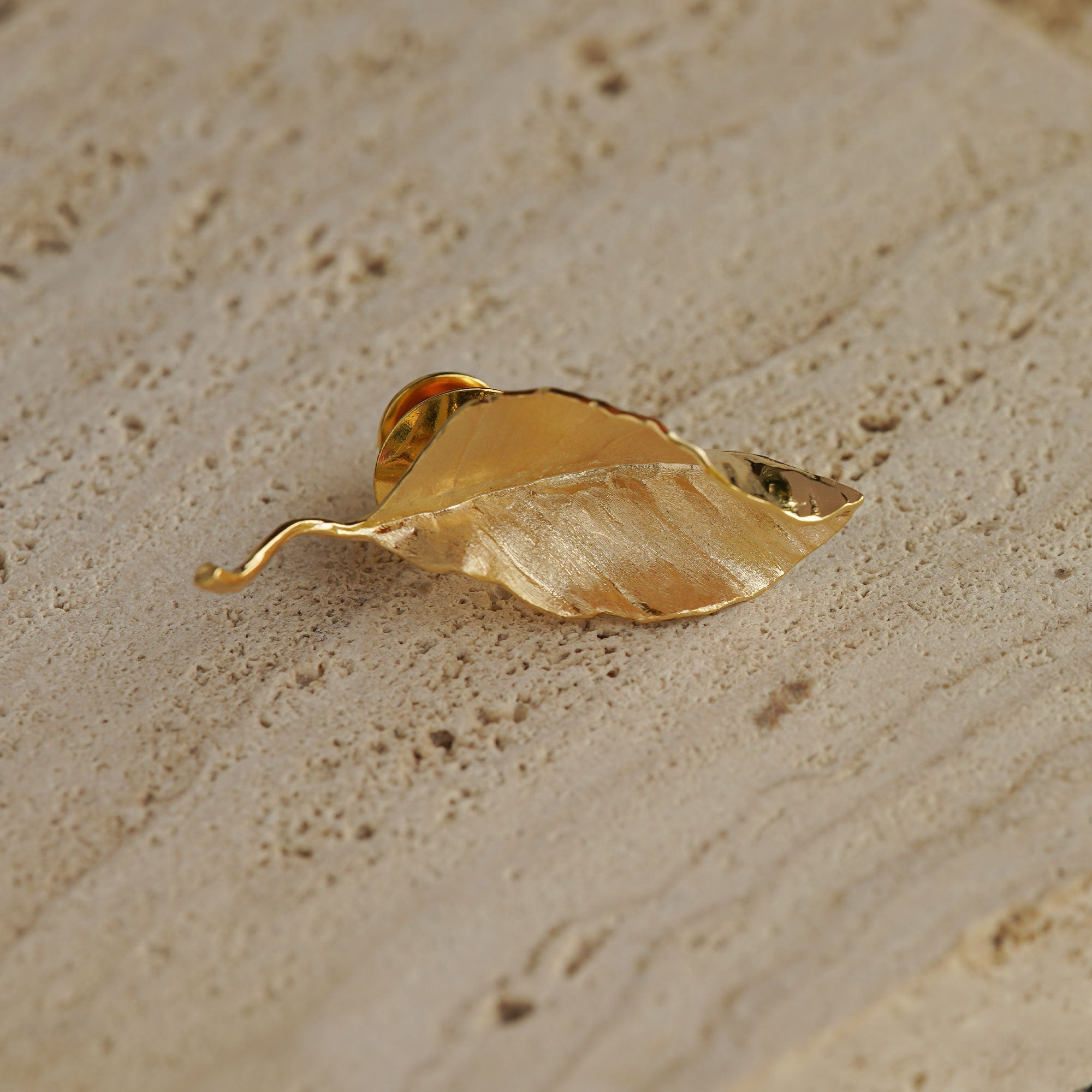 Leaf brooch styled as nature inspired jewelry