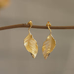 Leaf drop earrings with botanical design