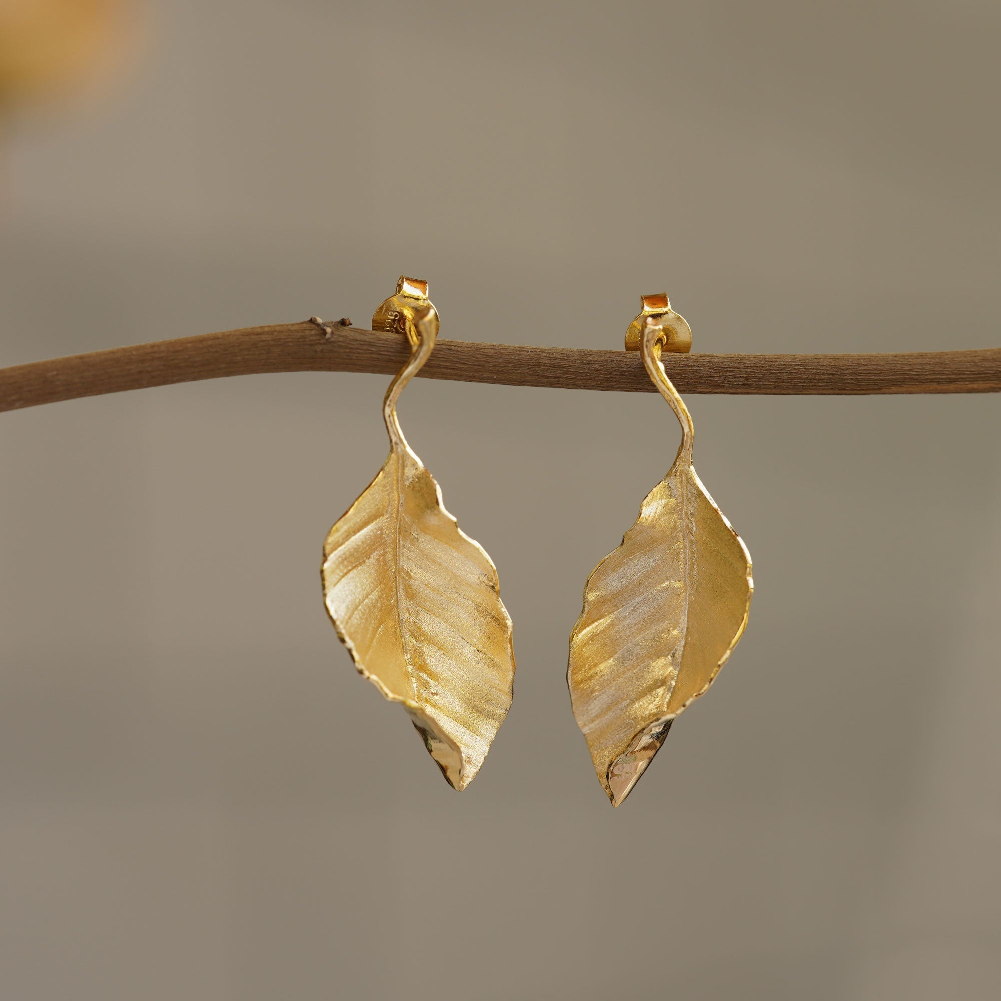 Leaf drop earrings with botanical design