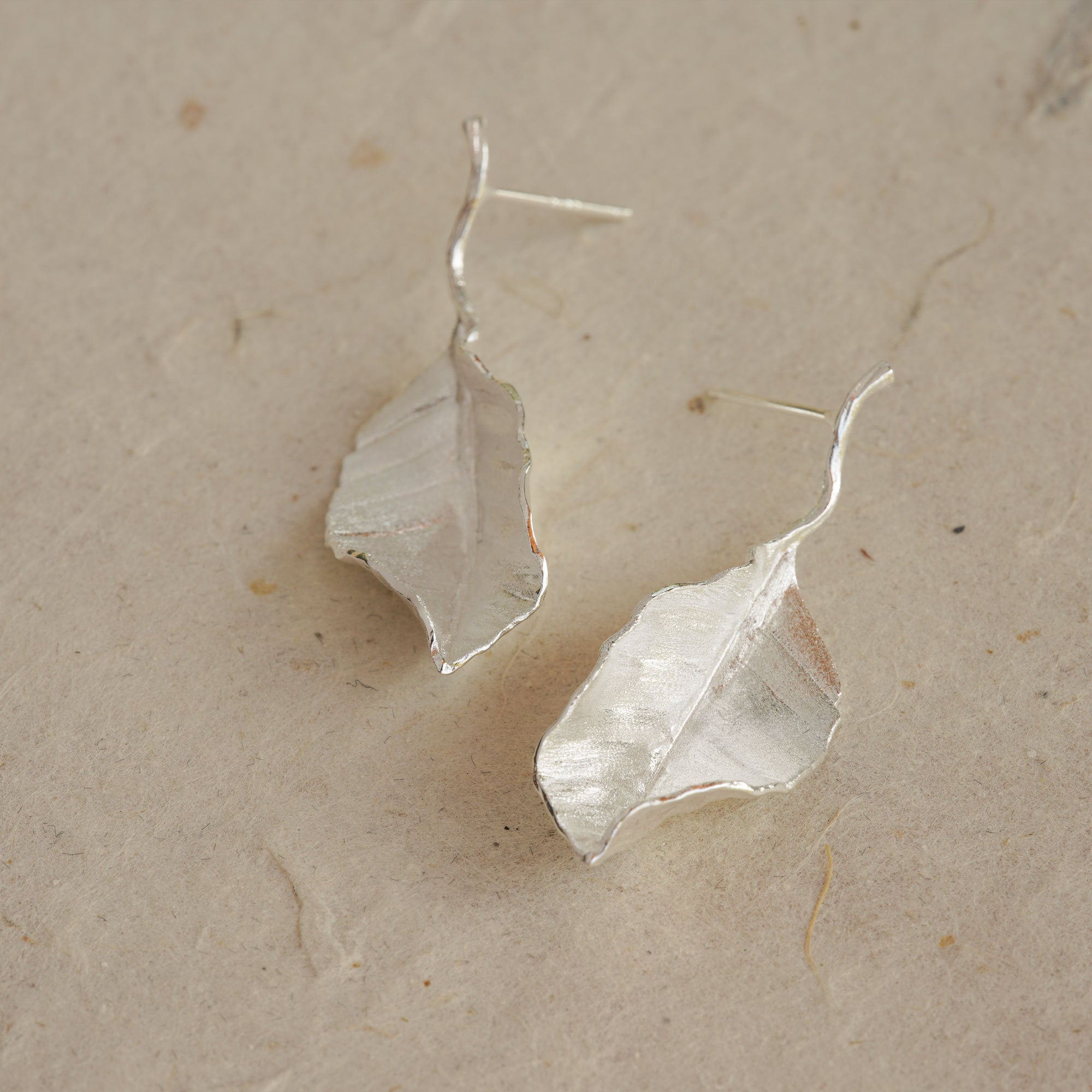 Leaf drop earrings with elegant botanical silhouette