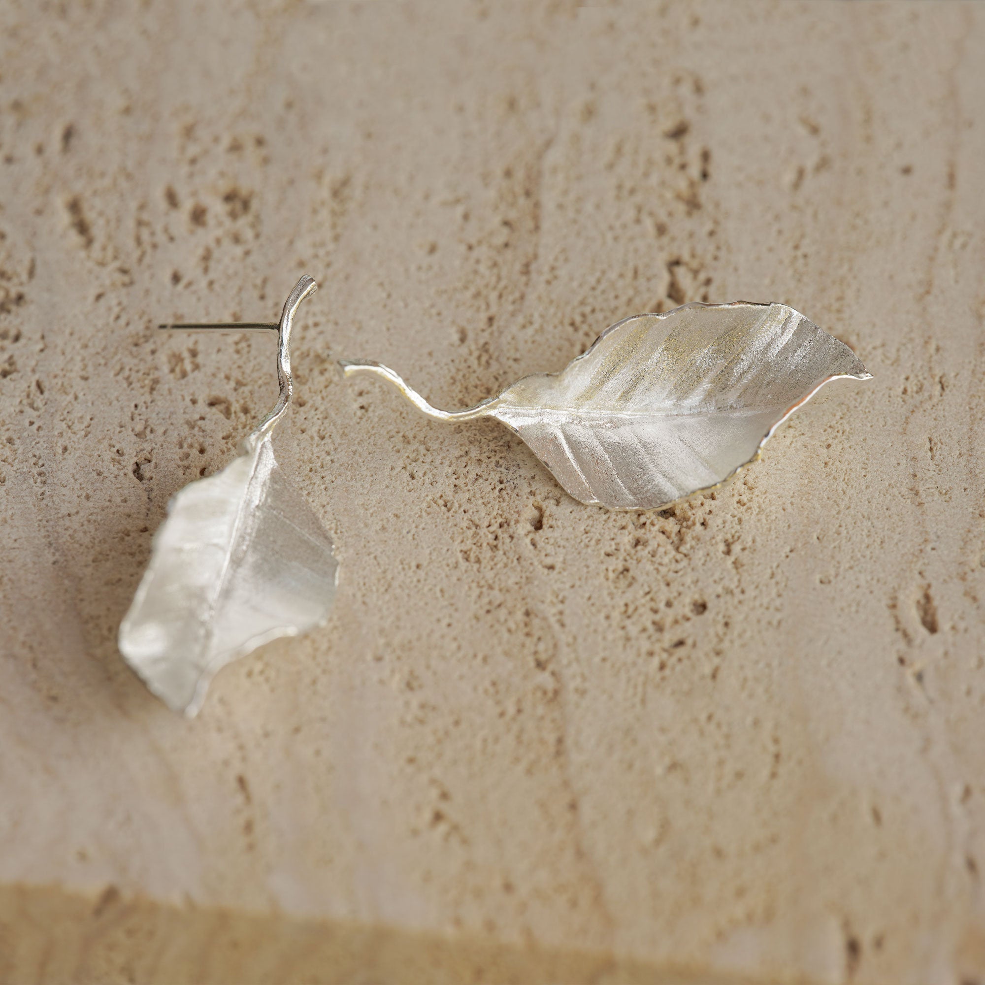 Leaf drop earrings styled as nature inspired jewelry