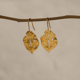 Leaf earrings styled as nature inspired jewelry