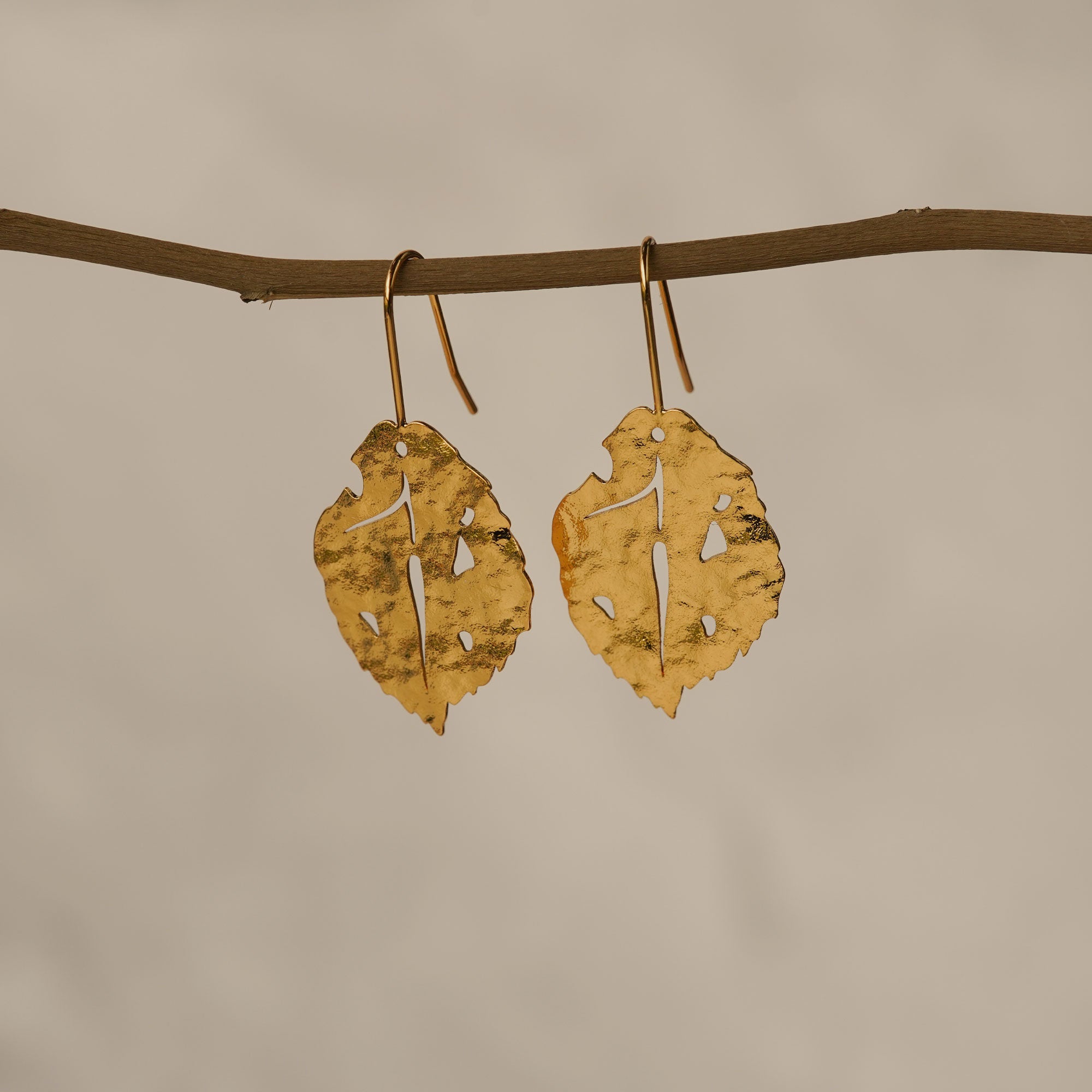 Leaf earrings styled as nature inspired jewelry